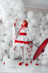 girl in kimano on the background of balls