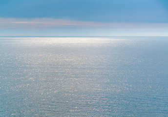 Blue sky with clouds over the sea