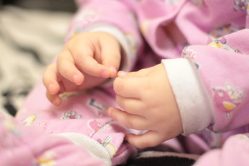 baby pens in pink pajamas