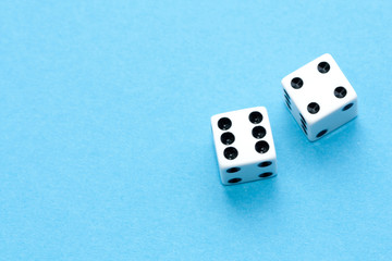 Gaming dices on blue background.