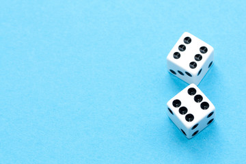 Gaming dices on blue background.