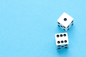 Gaming dices on blue background.