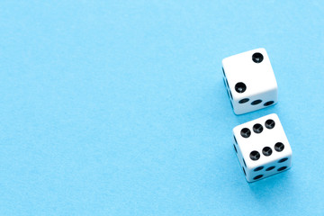 Gaming dices on blue background.
