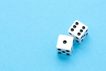 Gaming dices on blue background.