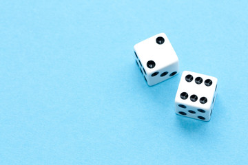 Gaming dices on blue background.