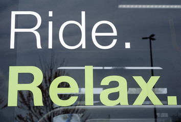 Obraz premium Ride and relax message on mass transit bus window