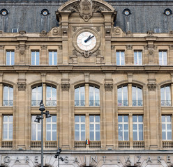 Fototapeta na wymiar Gare Saint-Lazare facede in Paris. Gare St-Lazare is one of the six large train stations of Paris.
