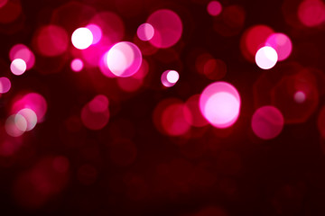 Abstract red bokeh background.Glitter vintage lights background.