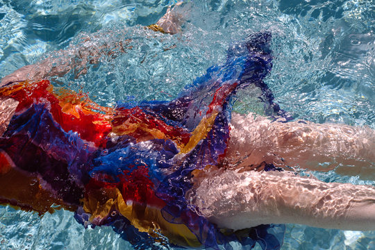 Colorful dress in pool