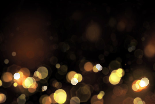Abstract gold bokeh background.Glitter vintage lights background.