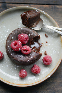 Chocolate molten lava cake with raspberries