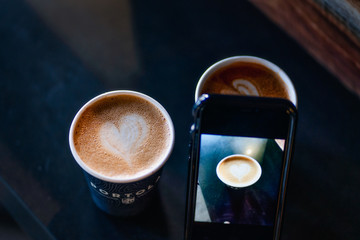 cup of coffee on black background