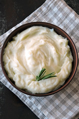 Mashed potatoes in a bowl. Homemade mashed potatoes with fragrant herbs.