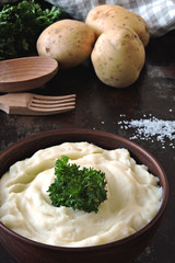 Mashed potatoes in a bowl. Homemade mashed potatoes with fragrant herbs.