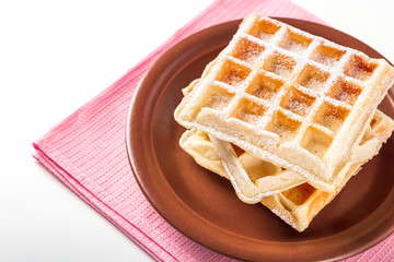 belgian waffles with icing sugar
