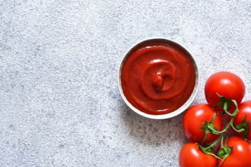 Tomato ketchup sauce with spices and pepper. View from above.