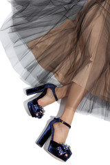 Pretty feminine image on snow white for holydays with long slim legs