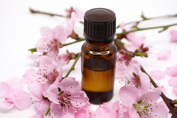 Cosmetic peach oil in a glass bottle Natural cosmetics