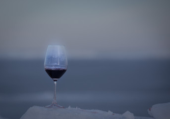 pouring a glass of red wine