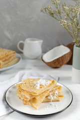 Morning, breakfast - traditional russian blini pancakes, french crepes, fresh coconut, milk bottle,...