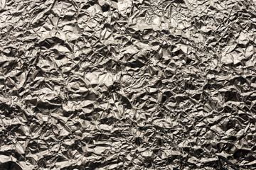 texture of rough putty on the silver wall.
