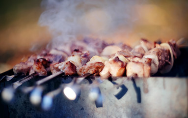 Grilling marinated shashlik
