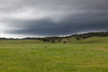 Fototapeta premium Rolling Hills with Storm Clouds