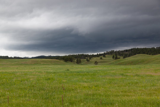 Rolling Hills with Storm Clouds