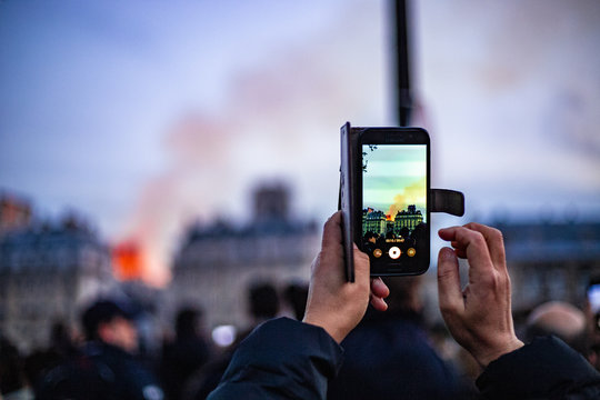 Notre Dame burning during sunset, Paris
