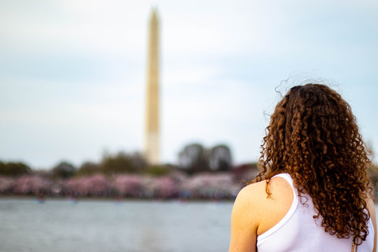 Woman looking at Washington Monument