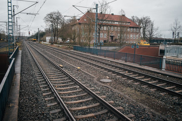 Fototapeta na wymiar Train station platform in vintage european style