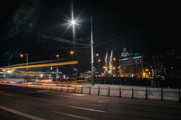 Fototapeta na wymiar Tram light trails at night european capital