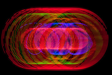 Trayectorias circulares formadas por LEDS de colores que se encienden y apagan al ritmo de...