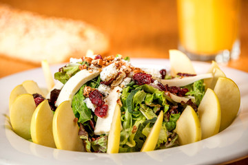 Salad with apple, cranberries and cheese