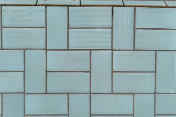 Ceramic german tile abstract texture in light blue color, typical soviet tiles on typical buildings