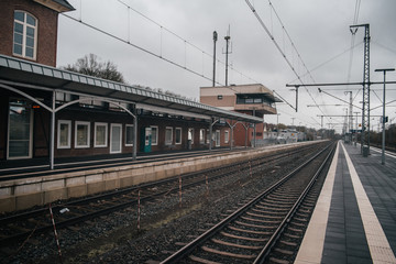 Fototapeta na wymiar Train station platform in vintage european style