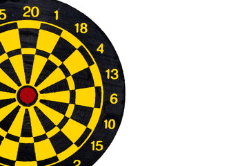 Black and yellow dartboard with copy space white background.