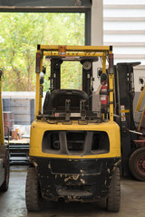 Forklifts in warehouse