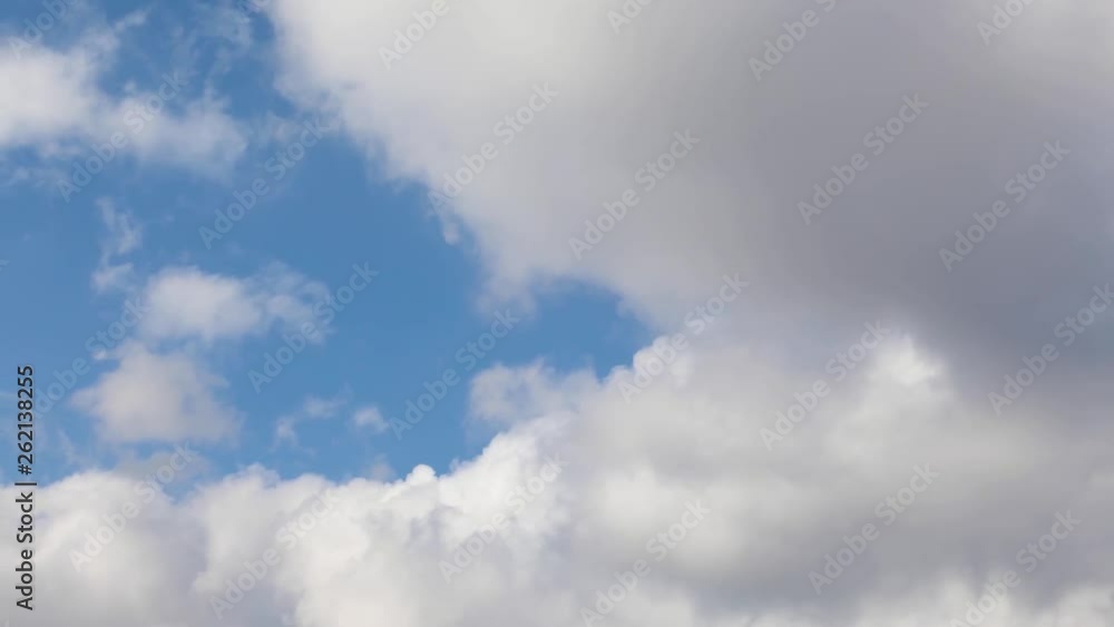 Wall mural cloudscape time lapse 01 loop - looping 60 second video footage features real clouds flying by in sm