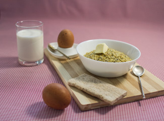healthy breakfast with eggs, oatmeal and milk