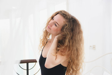 Naklejka premium The girl on the bed