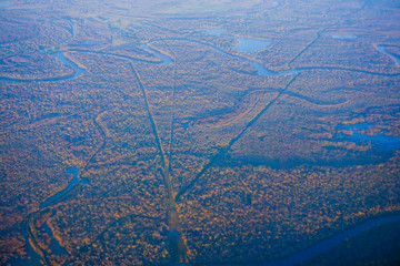 Aerial view of blue river of Houston Suburban	