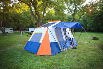 Blue and orange camping tent on a camping site