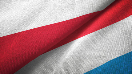 Poland and Luxembourg two flags textile cloth, fabric texture