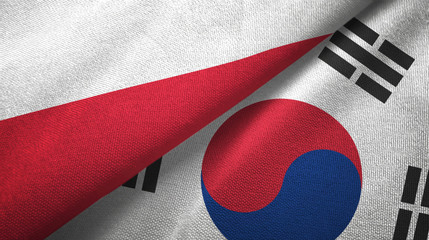 Poland and South Korea two flags textile cloth, fabric texture