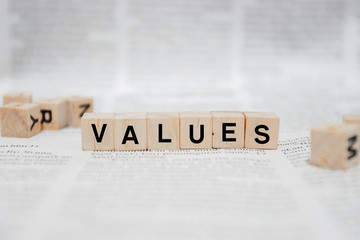 Values Word Written In Wooden Cube - Newspaper