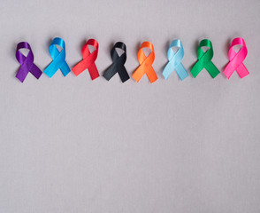 Different ribbons, symbols of cancer, cancer awareness month.  Copy space for your text.