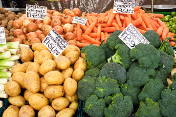 Broccoli, potatoes and other vegetables for sale at a market
