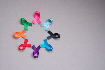 Different ribbons, symbols of cancer, cancer awareness month.  Copy space for your text.