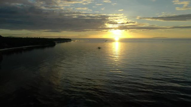 Sunrise drone shot at Alona Beach in Bohol island Philippines.